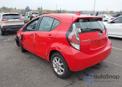 2015 Toyota Prius C Four from USA, damaged, VIN JTDKDTB37F1093804